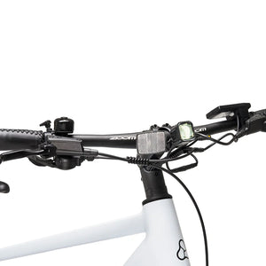 Angled view of the front integrated LED light and handlebars on the Hygge Lossø electric bike.