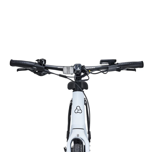 Close-up of the handlebar featuring the Tektro brake lever, bell, and Shimano components.