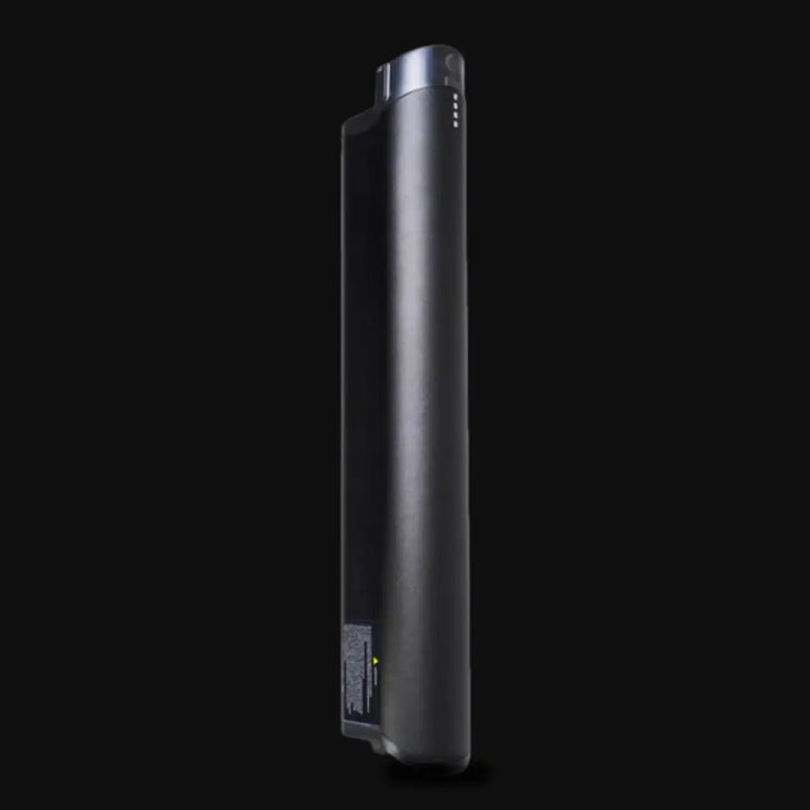 Close-up of the removable battery for the Hygge Lossø Commuter Hybrid Electric Bike 250W shown against a dark background.