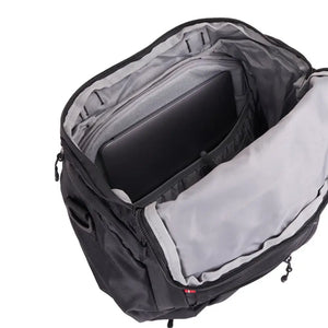 Interior view of the open Hygge pannier bag, highlighting the padded laptop sleeve and spacious internal pockets for organising work or school essentials.