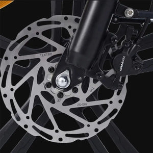 Close-up view of the disc brake system on the Hygge Sorø Fat Tyre Folding Electric Bike front wheel