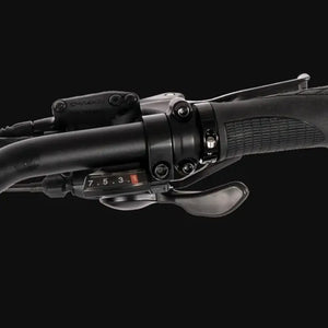 Close-up of the handlebar and gear shifter on the Hygge Sorø Fat Tyre Folding Electric Bike.