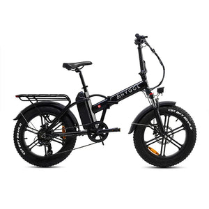 Hygge Vester folding fat tyre electric bike side profile showing compact frame, rear rack and wide tyres.