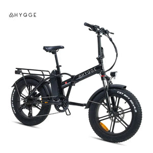 Side profile of the black Hygge Vester 2025 folding electric bike, featuring 20-inch fat tyres and a step-over frame.