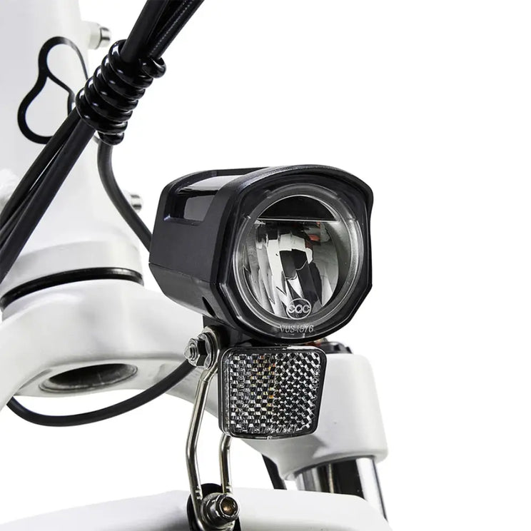 Hygge Vester electric bike LED front light with integrated reflector for improved visibility and safe riding in low-light conditions.