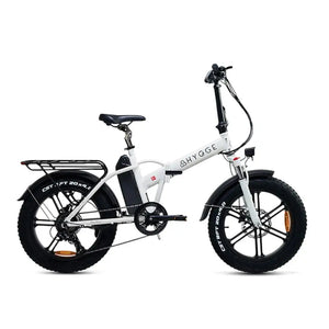 Hygge Vester folding electric fat bike in white with rear cargo rack side view.