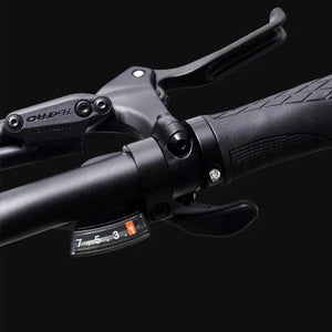 View of the handlebar and gear shifter on the Hygge Vester Folding Fat Tyre Electric Bike 250W.