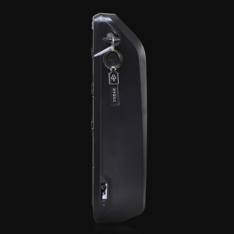 The removable battery for the Hygge Vester Folding Fat Tyre Electric Bike 250W shown against a dark background.