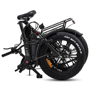 The black Hygge Vester Step electric bike in its fully folded position, demonstrating its compact size for storage.