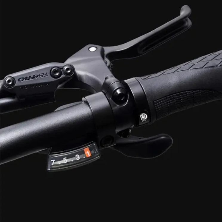 View of the handlebar and gear shifter on the Hygge Vester Step Folding Fat Tyre Electric Bike 250W.