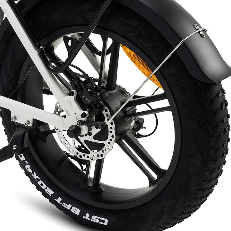 Close-up of the rear wheel on the Hygge Vester Step, highlighting the ventilated disc brake rotor for safe stopping power.