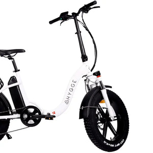 View of the white Hygge Vester Step electric bike, showcasing its easy-access step-through frame and front suspension fork.