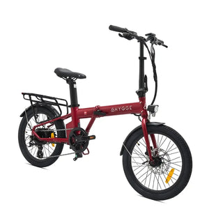 Front angled view of the Hygge Virum Folding ebike in red, showing the step-through frame.