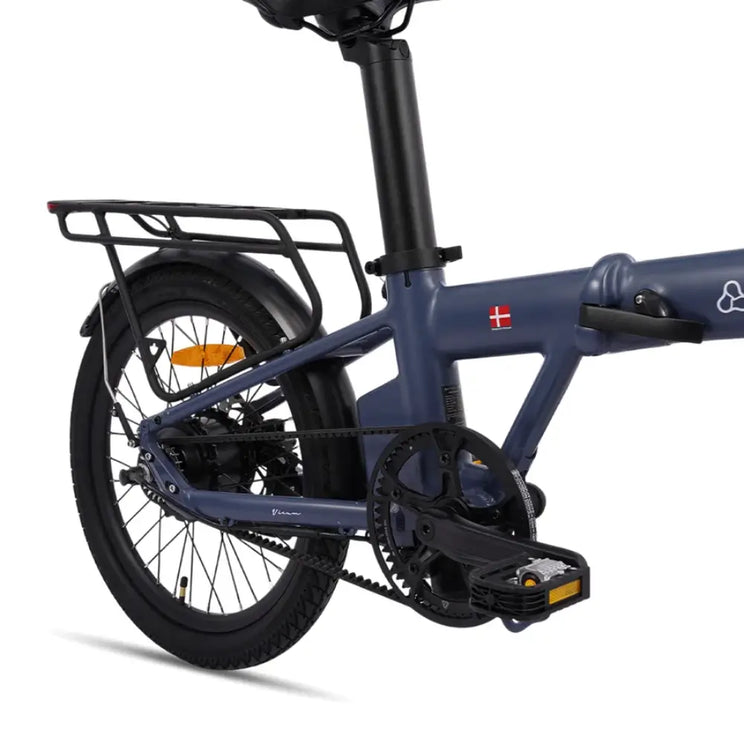 Hygge Virum folding e bike rear rack and drivetrain detail showing cargo rack and compact urban setup.