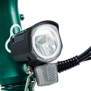 Hygge Virum folding ebike green frame with integrated LED front headlight and reflector.