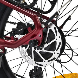 Hygge Virum folding ebike red frame with Tektro rear hydraulic disc brake and rotor detail.