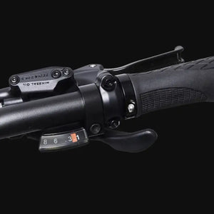 The handlebar and gear shifter on the Hygge Virum Folding Electric Bike.