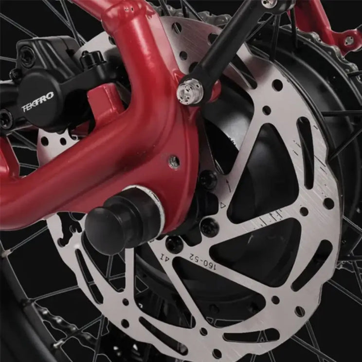 Hygge Virum electric bike disc brake rotor and caliper detail providing reliable stopping power and safety.