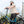 Tall rider standing with Hygge Virum step through electric bike demonstrating frame accessibility and size suitability.