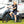 Rider using Hygge Virum folding electric bike near a camper van, highlighting portability and outdoor lifestyle use.