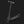 Angled view of the InMotion S1 folding electric scooter in black, featuring front suspension and a wide textured foot deck for stability.