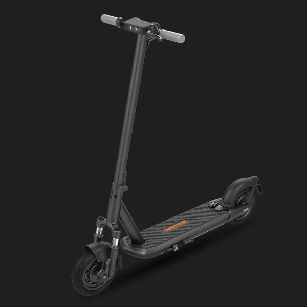 Angled view of the InMotion S1 folding electric scooter in black, featuring front suspension and a wide textured foot deck for stability.