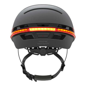 Back view of the Livall BH51M Neo smart cycling helmet in black showing bright LED light strip for enhanced road visibility.