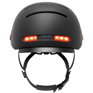 Front view of the Livall BH51M Neo smart cycling helmet in black, showing bright LED light.