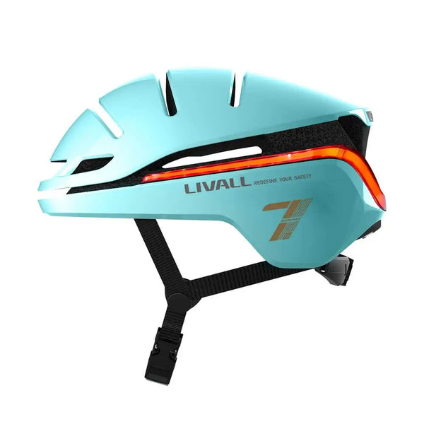Angled side view of the Livall EVO21 smart cycling helmet in mint with black straps, highlighting LED light strip and safety-focused design.
