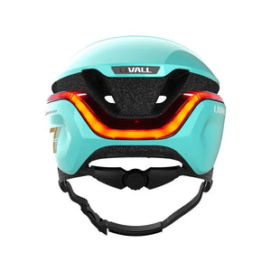 Rear view of the Livall EVO21 smart cycling helmet in mint, featuring bright LED tail lights for enhanced road visibility.