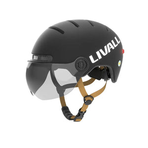 Angled view of the Livall L23 smart urban cycling helmet with integrated visor, LED rear light, and adjustable brown strap.