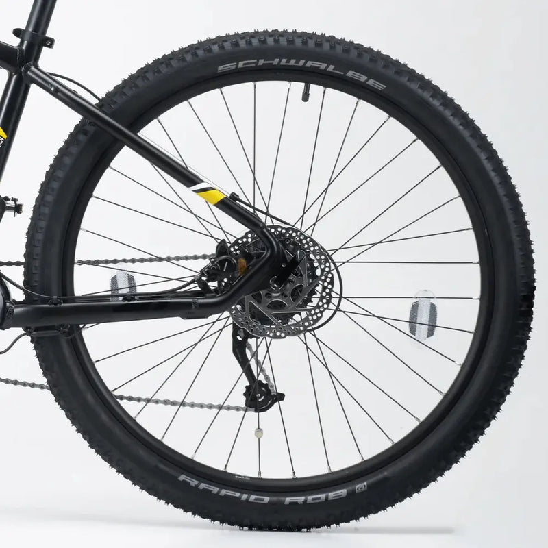 Close-up of the rear wheel featuring Schwalbe Rapid Rob tires and Shimano hydraulic disc brake rotor on the Mark2 Scrambler C.