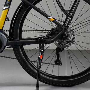 The robust, adjustable kickstand and hydraulic rear disc brake assembly on the Mark2 Scrambler CX trekking e-bike.