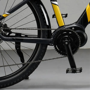 Detail view of the powerful mid-drive electric motor and crankset on the Mark2 Scrambler CX, designed for efficient power transfer.