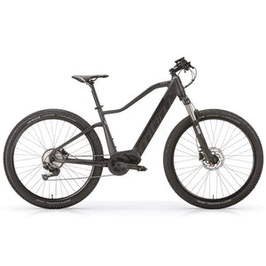 Side profile view of the black MBM Kairos electric mountain bike featuring 27.5-inch wheels and a step-down top tube.