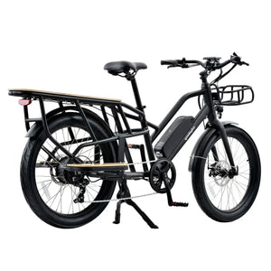 Side profile view of the black Revom ECargo 2.3 electric bike featuring a front basket and rear wooden plates.