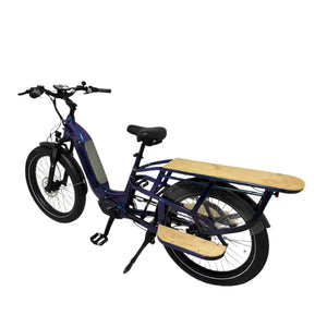 Revom C2 eCargo electric bike rear cargo rack with wooden platform and passenger footrests for carrying loads.