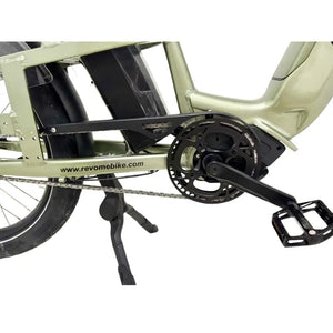 Revom C2 eCargo electric bike crankset and pedal detail showing drivetrain components and mid frame motor area.