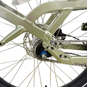 Revom C2 eCargo electric bike rear hub motor and drivetrain detail showing spokes, cassette and cargo frame structure.