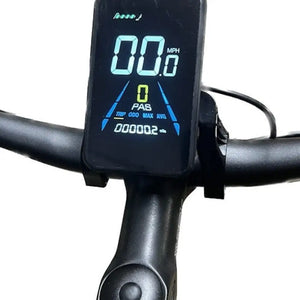 Close-up of the center-mounted color LCD display on the Revom ECargo bike, showing speed, battery life, and pedal assist levels.