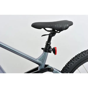 close-up of revom m1 full-suspension e-mtb saddle and seatpost