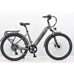 Side profile view of the grey Revom ST04 Tourer electric bike featuring a low step-through frame and rear rack.