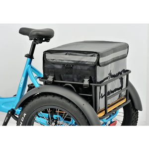 The blue Revom T1 urban electric trike highlighting the rear cargo basket.