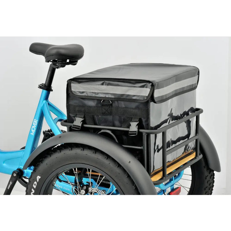 The blue Revom T1 urban electric trike highlighting the rear cargo basket.