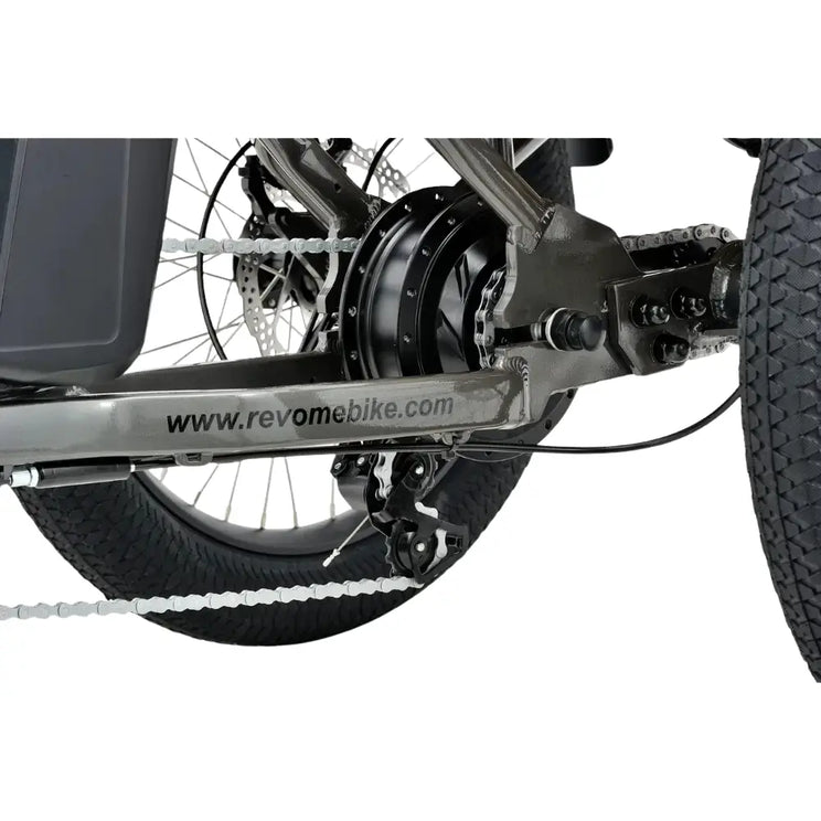 Close-up view of the rear hub motor and drivetrain on the Revom T1F Electric Tricycle in matte grey.