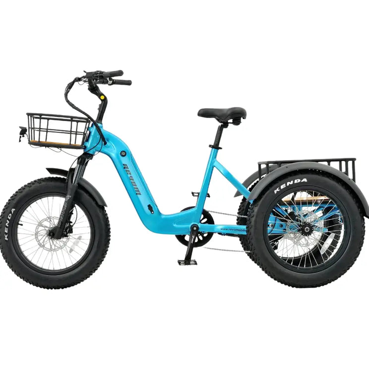 Side profile view of the blue Revom T2 electric trike featuring a low step-through frame and fat off-road tires.
