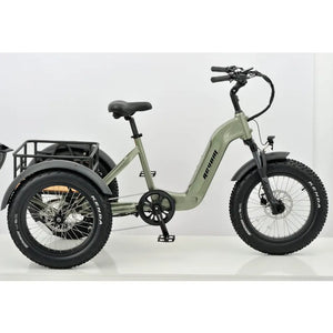 Front angled view of the light green Revom T2 electric mountain trike with black front basket and LED headlight.