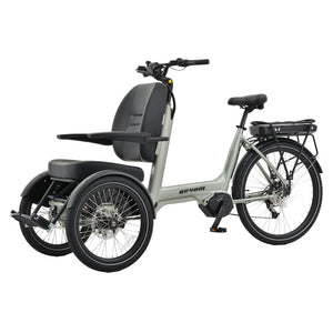 Angled front view of the Revom T5 passenger electric trike showing the padded seat with armrests