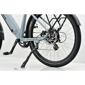 Detail view of the rear hub motor, cassette, and heavy-duty kickstand on the grey Revom U1 electric bike.