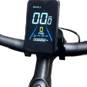 Close-up of the bright color LCD display on the Revom U1 handlebars, showing speed, battery level, and pedal assist mode.